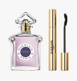 Close-up of Guerlain Insolence perfume bottle and mascara, available at Cosmetics Corner.